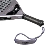 NOX AT10 Genius Attack 18K Alum 2027 padel racket - handle and wrist strap detail